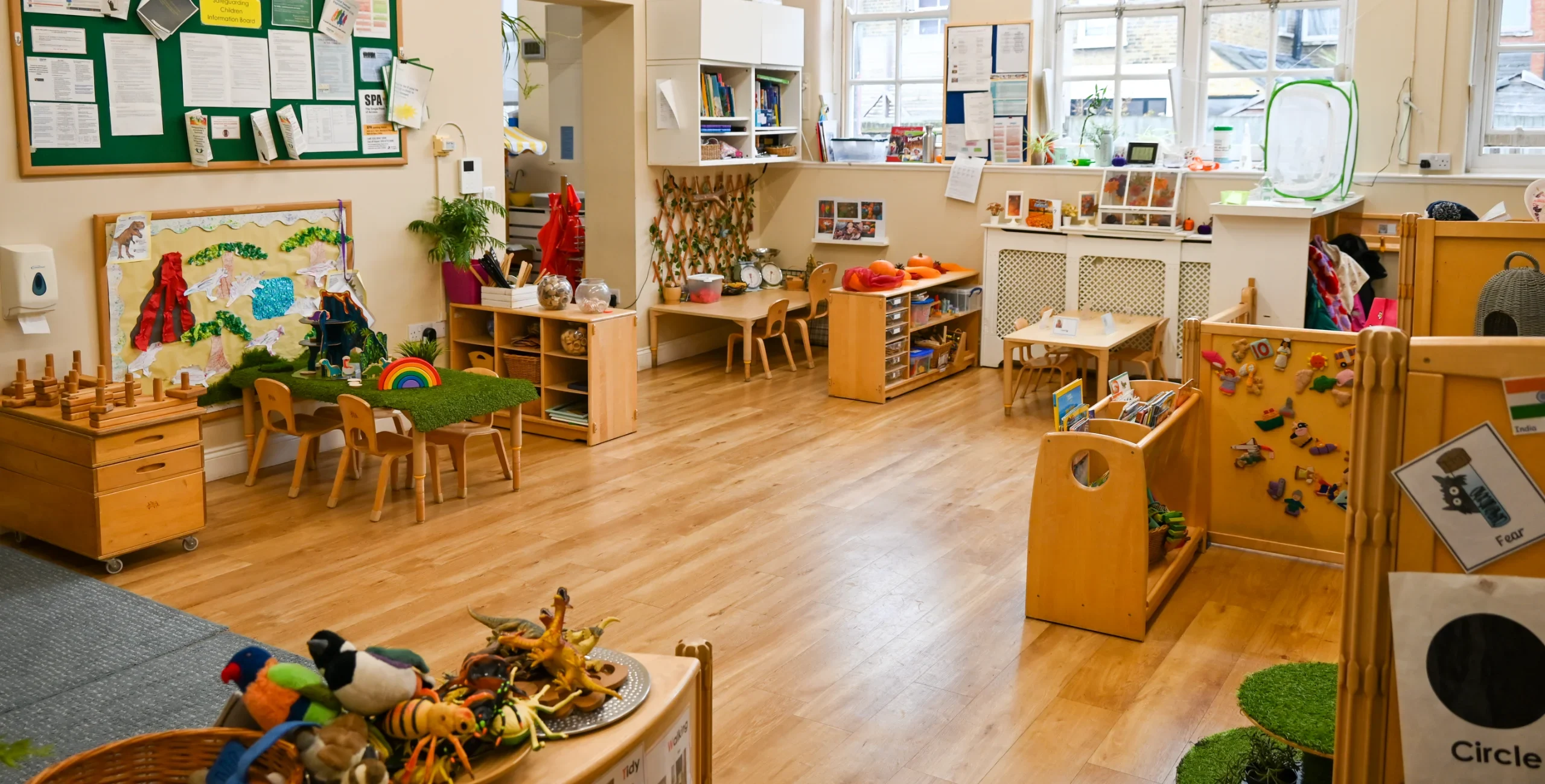 Bright, organised Mortlake nursery classroom with educational toys.